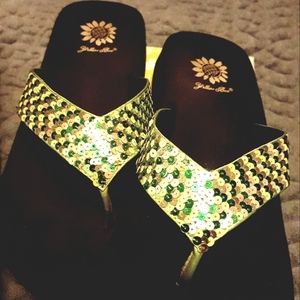 Yellow box like green glitter flip flops